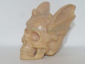 Agate Skull With Wings Orange Calcite